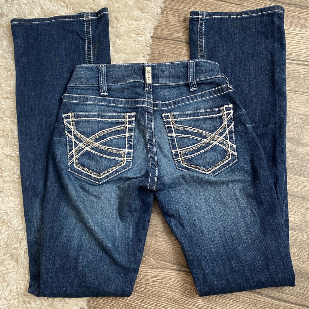 ARIAT R.E.A.L. Mid Rise Stretch Entwined Boot Cut Jean in marine size 27L